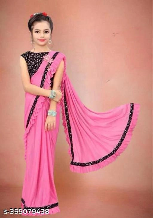 Lycra Solid Saree for Girls (Baby Pink, 3-4 Years).Elegant and comfortable lycra solid saree for girls aged 3–4 years. Soft, stretchable, and perfect for festivals, parties, and special occasions.