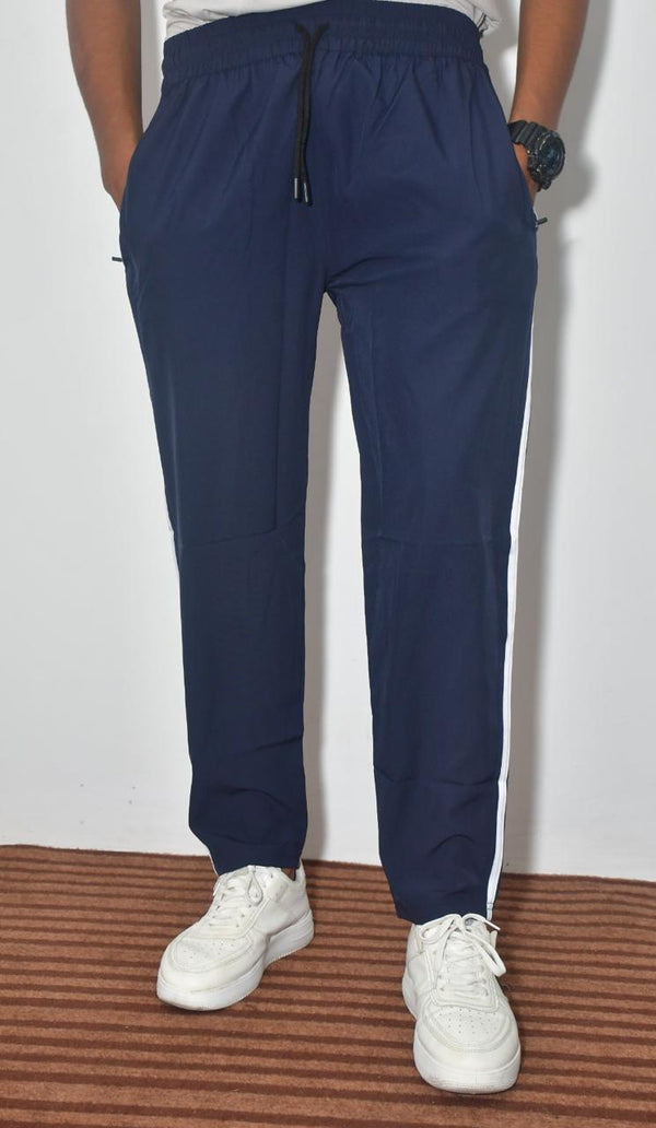 Men's Track Pants.Stylish and comfortable men’s track pants. Perfect for casual wear, workouts, gym, jogging, and outdoor activities. Breathable, soft, and durable fabric.