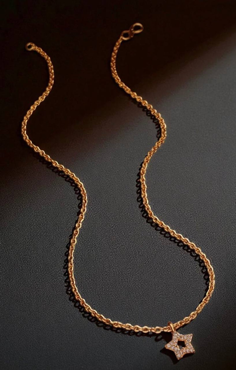 Rose Gold Tone rope chain necklace with a star pendant