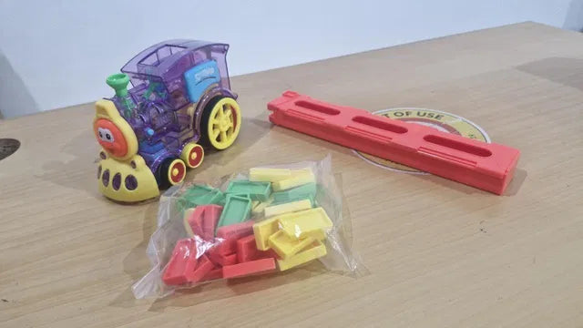 Train Toy Domino Set for Kids – BPA-Free Plastic with Sound Effects.Make playtime fun and educational with Train Toy Domino Set for Kids. BPA-free plastic, automatic domino laying, sound effects, and safe design for creative learning.