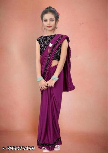 Lycra Solid Saree for Girls (Purple, 3-4 Years).Beautiful and comfortable lycra solid saree for girls aged 3–4 years. Soft, stretchable, and perfect for festivals, parties, and special occasions.