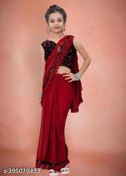Lycra Solid Saree for Girls (Red, 3-4 Years).Elegant and comfortable lycra solid saree for girls aged 3–4 years. Soft, stretchable, and perfect for festivals, parties, and special occasions.